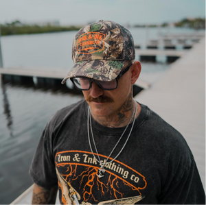 New Camo trucker hat- blaze orange